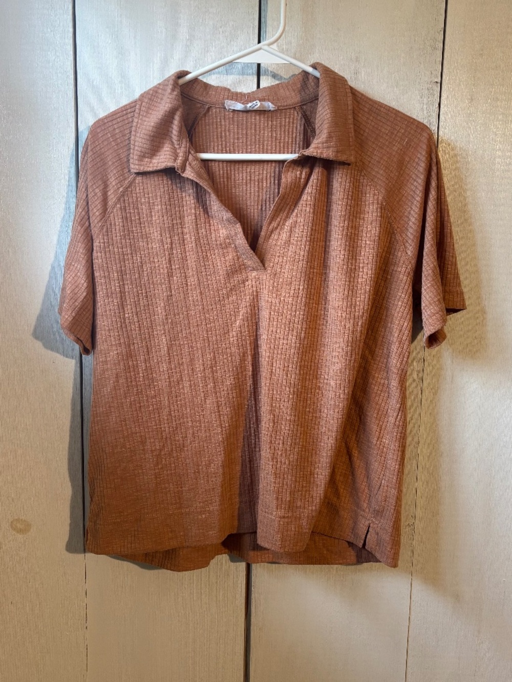 Woman’s burnt orange collard tshirt